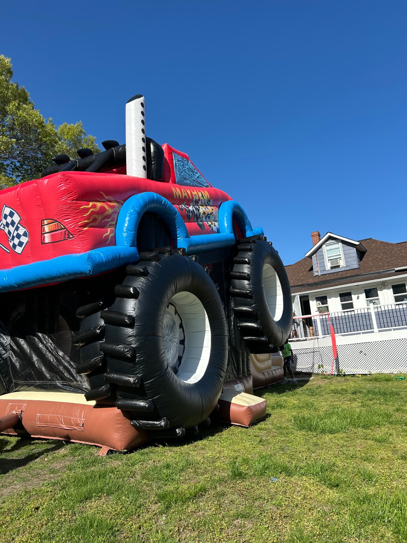Monster truck bounce house front view