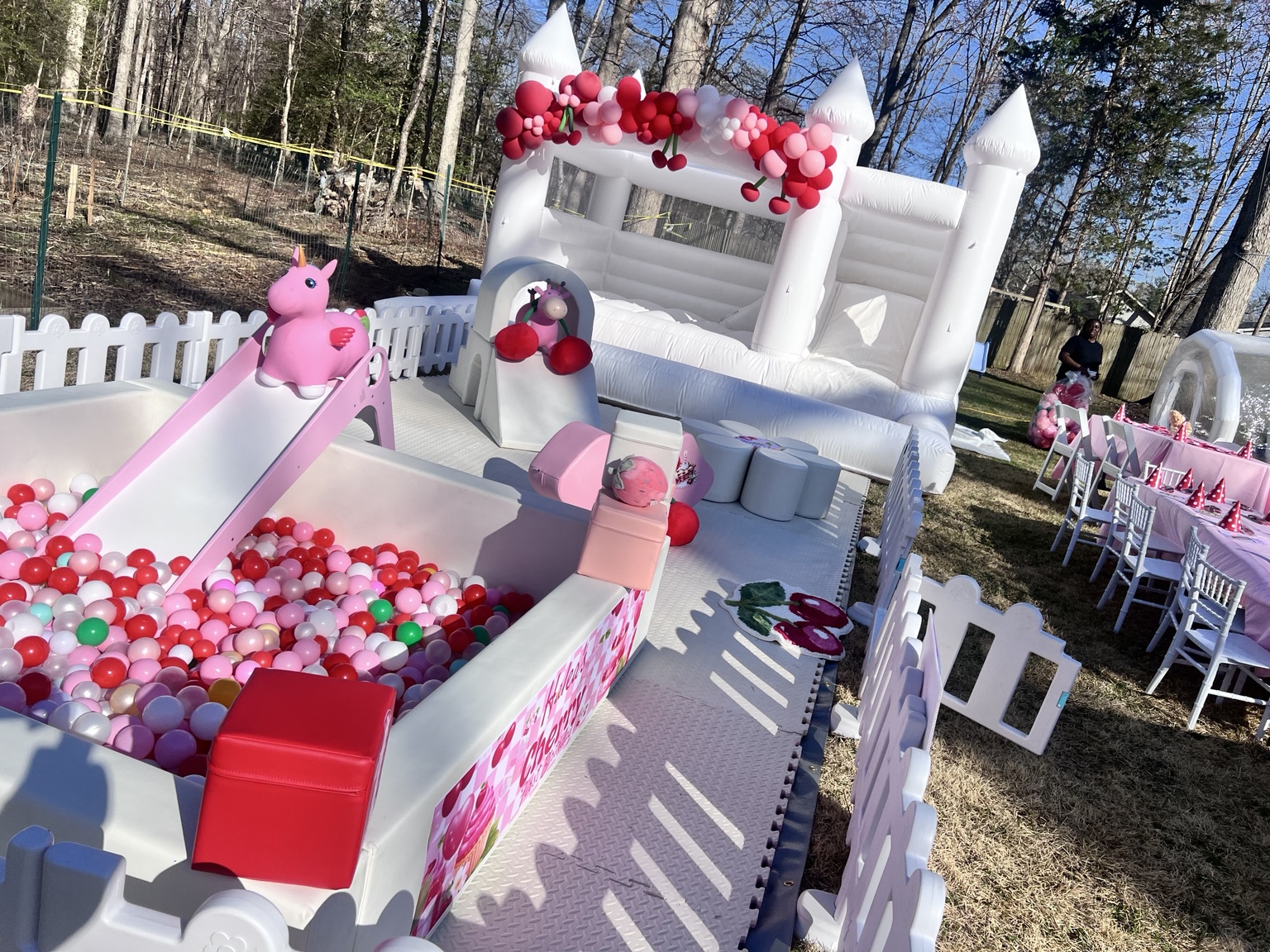 Playland Deluxe with white bounce house — real setup